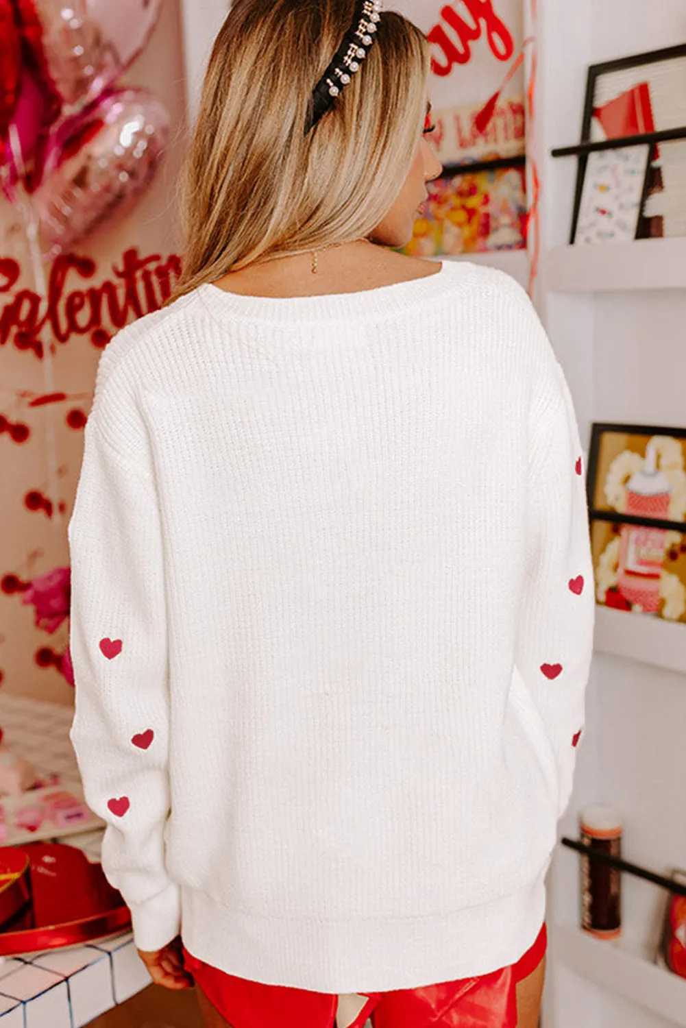 Pull blanc à col rond et épaules tombantes en forme de cur